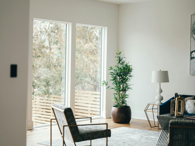 Open-plan living area with premium flooring installation and contemporary design finishes in Frisco CO
