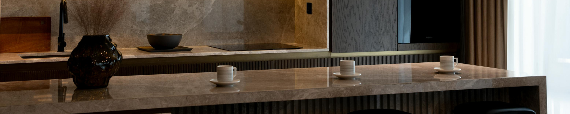 Flooring product catalog display showing hardwood, carpet, vinyl, and tile samples at All Flooring Design showroom in Frisco Colorado